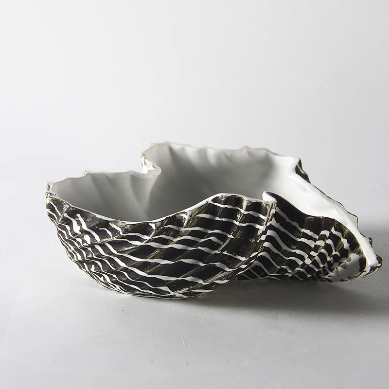 bol coquillage argenté rayures noires blanches moderne intérieur décoration table élégance servir fruits collations