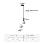 suspension lumineuse ornement sphérique blanc matière transparente moderne fixation câbles inclusion câble électrique