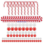 bougies flottantes noel transparentes cannes sucre boules rouges vertes blanches