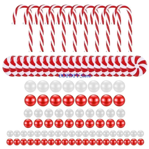bougies flottantes noel transparentes cannes sucre boules rouges vertes blanches