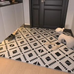 tapis d'entrée extérieur pvc noir blanc motif géométrique moderne antidérapant couloir porte