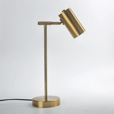 Lampe de chevet dorée moderne avec abat-jour noir sur table de nuit