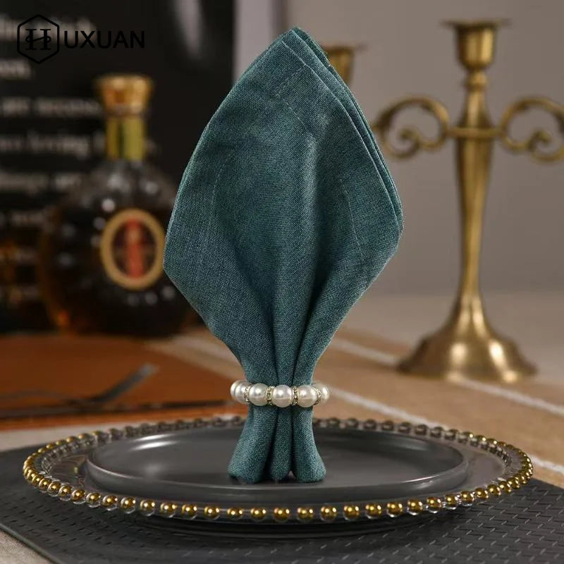anneau serviette strass dorés classique élégant blanc or événements table luxueux fixations
