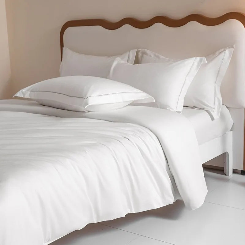 Housse de couette blanche en coton égyptien avec taies d'oreiller assorties