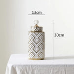 vases décoratifs modernes motifs géométriques or blanc couvercle transparent élégants intérieurDecoration