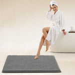 tapis bain moderne beige bleu clair gris antidérapant texture bouclée absorbant sol