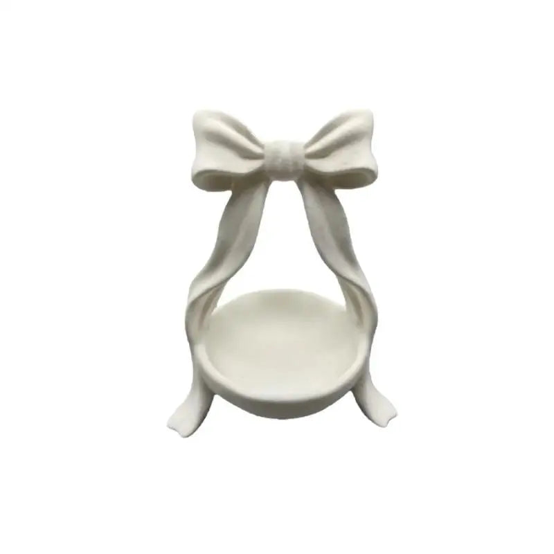 support bijoux blanc satiné nœud décoratif classique décoration intérieure rangement bijoux