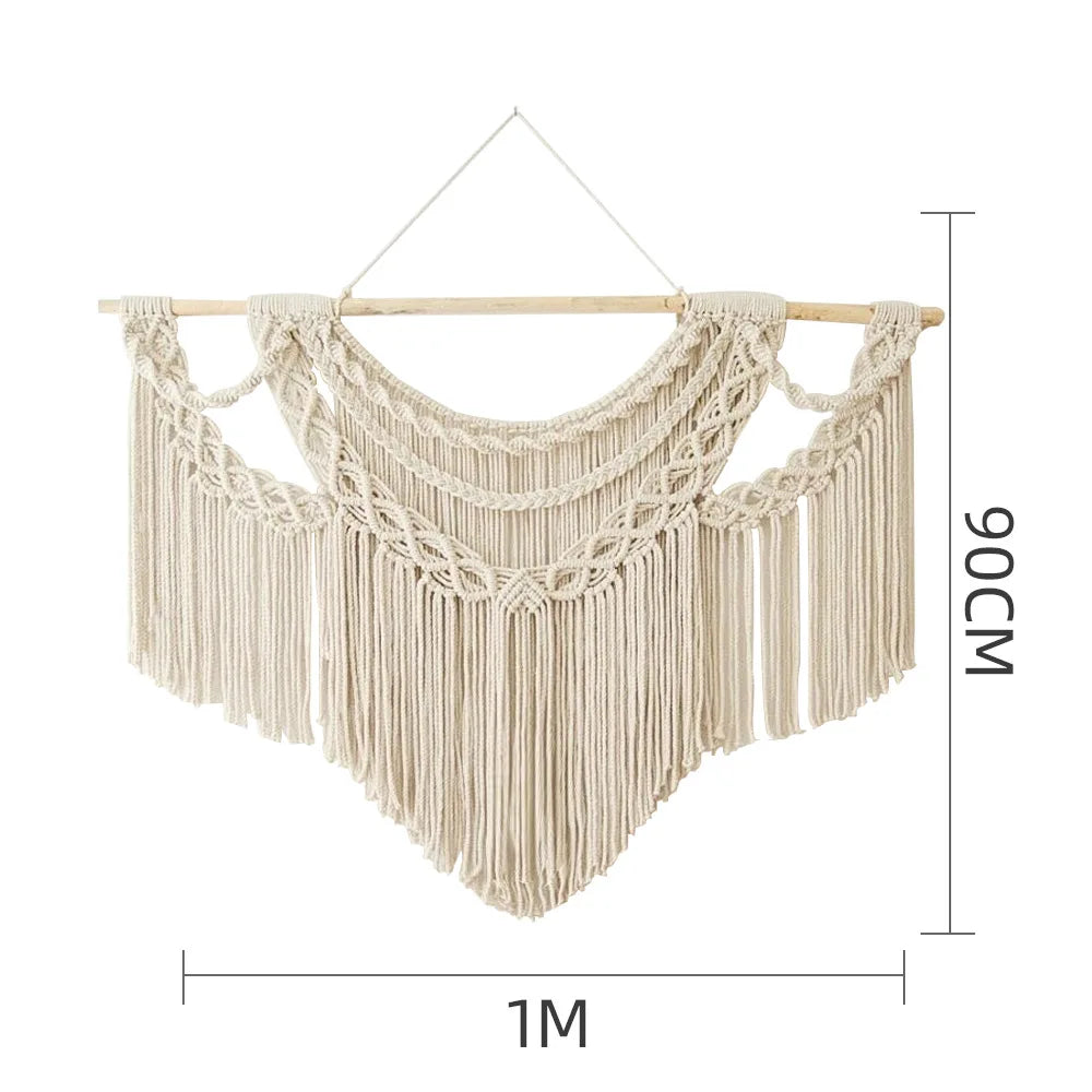 tapisserie macramé boho chic motifs géométriques franges beige clair tige bois crochets métalliques