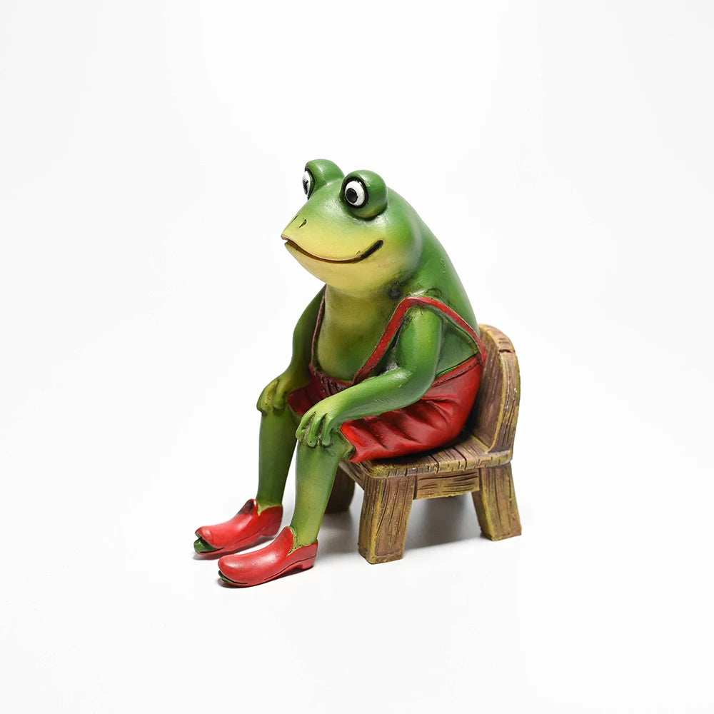 statue grenouille verte banc bois grenouille chaussures rouges deco jardin pastel fantaisiste