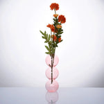 vase moderne transparent sphères empilées jaune clair rose bleu vert brun