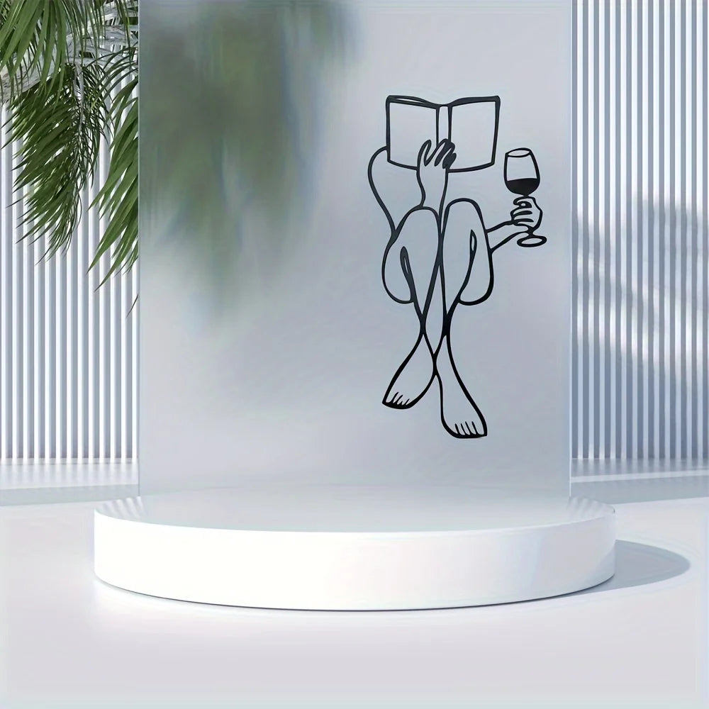 sculpture murale noir silhouette lecture vin minimaliste métal fixations invisibles chambre salon