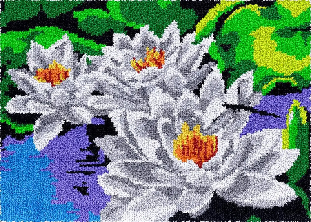 tapis broderie fleurs motifs colorés fond vert bleu laine main instructions grille