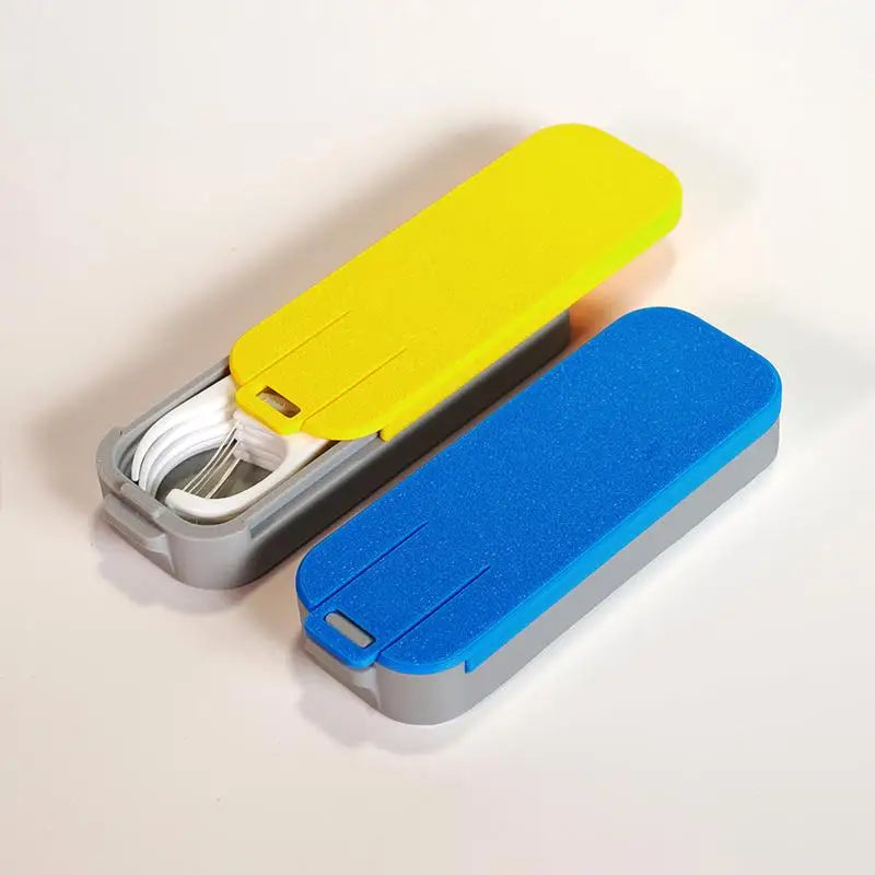boîte rangement câbles gris jaune bleu texture mat moderne anneau fixation portable sécurisée