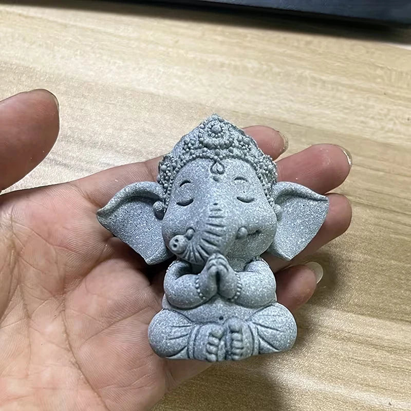 figurine éléphant gris artisanal texture granulée décoration maison prière collection deco intérieure statuette