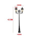 lampadaire extérieur or noir verre translucide vintage élégant détails sculptés deux lampes abat jours