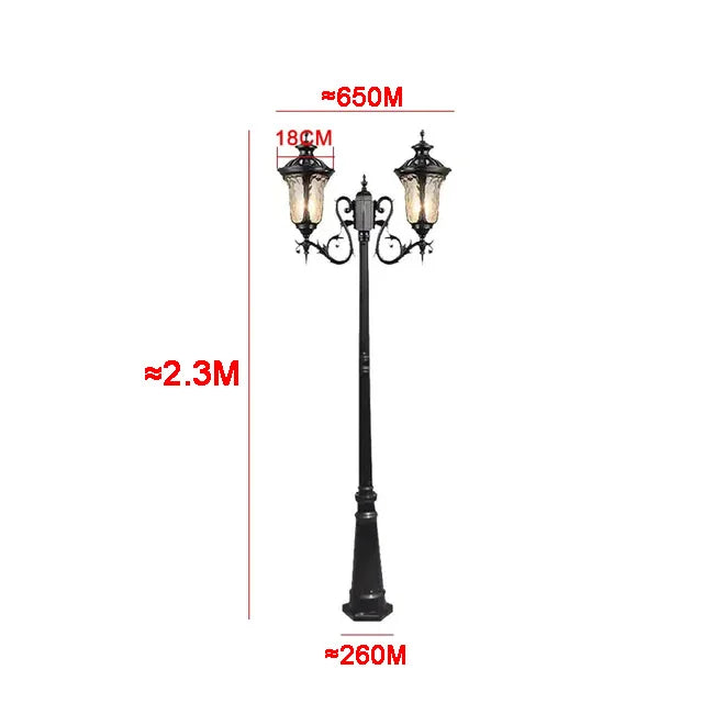 lampadaire extérieur or noir verre translucide vintage élégant détails sculptés deux lampes abat jours