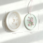 cadre décoratif ovale silicone fleurs reliefs artisanal clips ruban couleurs variées maison