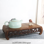 support bois sculpté motifs floraux traditionnel marron foncé objets décoratifs affichage thé
