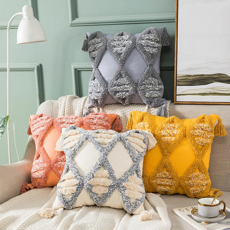 coussin brodé géométrique moderne toile coton couleur beige pompons décoratif