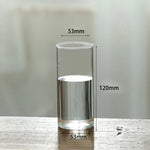 vase verre transparent moderne base bois fleurs artificielles inclusion chambre