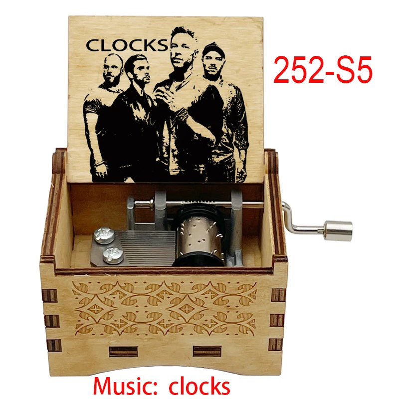 boîte musicale bois naturel motifs floraux 18 tons vintage manivelle horlogerie artisanale