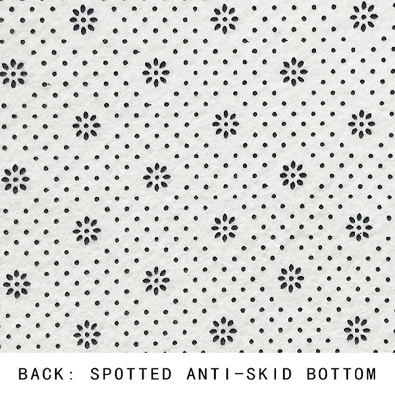 tapis salon rectangulaire blanc motif fleurs points noir moderne décoration maison intérieur doux