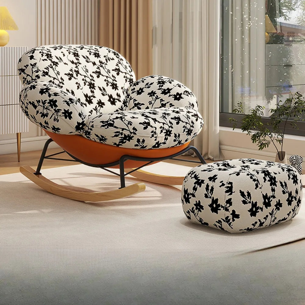 fauteuil bascule moderne beige noir orange roulettes coussin repos minimaliste salon