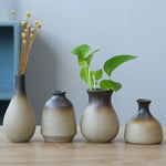 vase decoratif moderne minimaliste beige brun foncé texture grungy ombre douce decoration table fleur