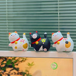 statuette chat céramique artisanale fleurs pois rubans couleurs vives décoration intérieure traditionnelle japonaise anniversaire