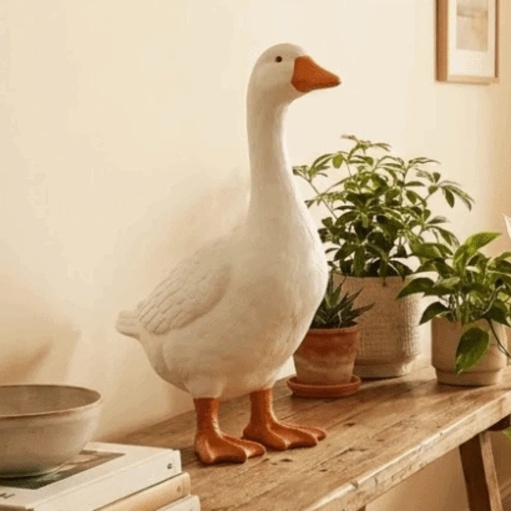 statue canard blanc plumes texture lisse tête bec orange moderne intérieur extérieur jardin