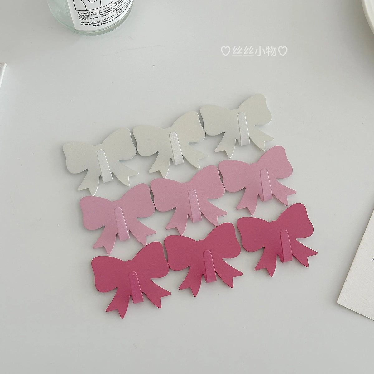 clips décoratifs nœuds blanc rose clair rose foncé modernes brillants sans perçage