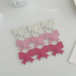 clips décoratifs nœuds blanc rose clair rose foncé modernes brillants sans perçage