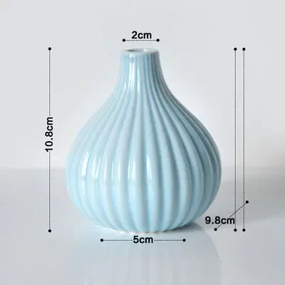 vase decoratif moderne rose bleu clair blanc strie minimaliste table fleurs artificielles