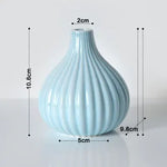 vase decoratif moderne rose bleu clair blanc strie minimaliste table fleurs artificielles