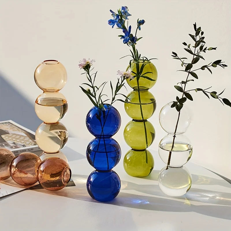vases transparents modernes sphères empilées bleu vert marron beige