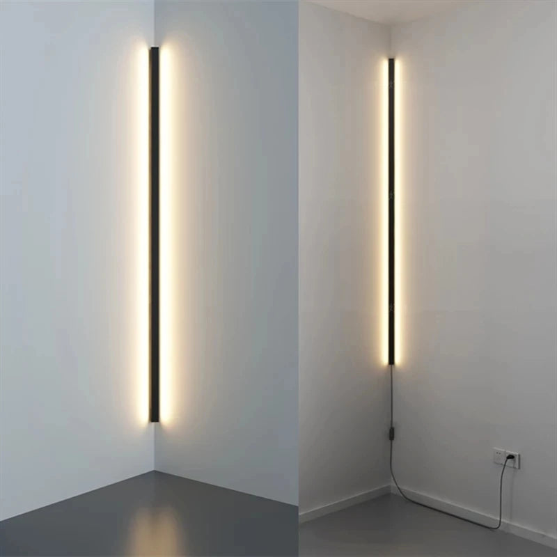 Applique murale d'angle LED noire installée dans un coin de chambre moderne