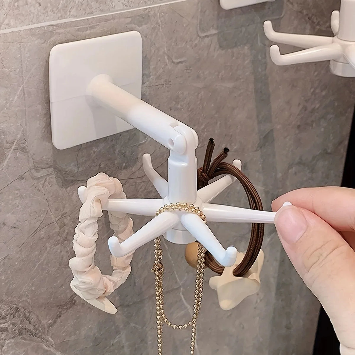 porte bijoux organisateur mural crochets adhésifs moderne minimaliste blanc noir elastiques cheveux lunettes headband