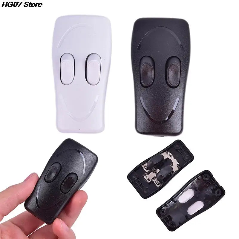 télécommande moderne blanc noir interrupteur bouton poussoir vis fixations rondes lisses