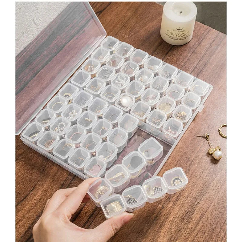 boîte rangement bijoux transparent compartiments amovibles pratique moderne organisation accessoires voyage commercialisée grids