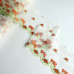 tissu polyester dentelle broderie fleurs rubans bordure élégant blanc orange vertclair 11cm 3mètres translucent