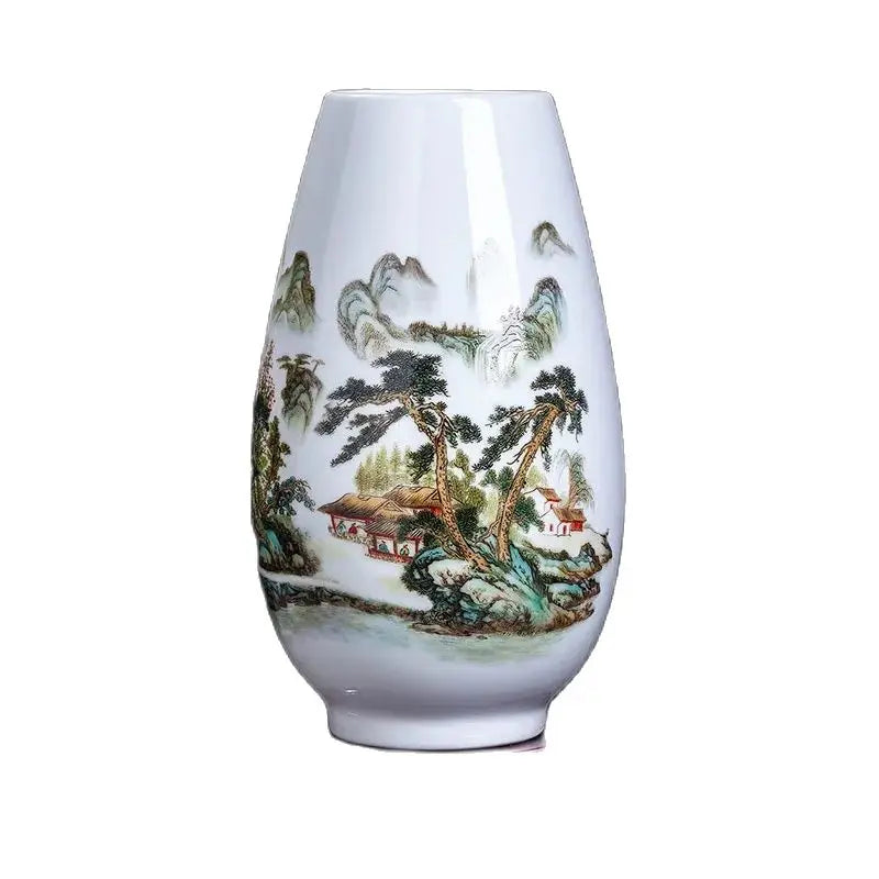 Vase en porcelaine peint à la main avec un paysage montagneux, une maison de campagne et des arbres.