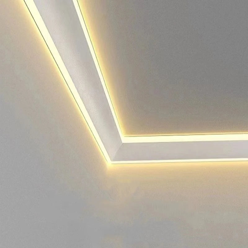 Installation de bande LED dans un coin de plafond salon