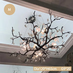 suspension luminaire branches cuivre fleurs artificielles moderne noir blanc salon salle manger intérieur