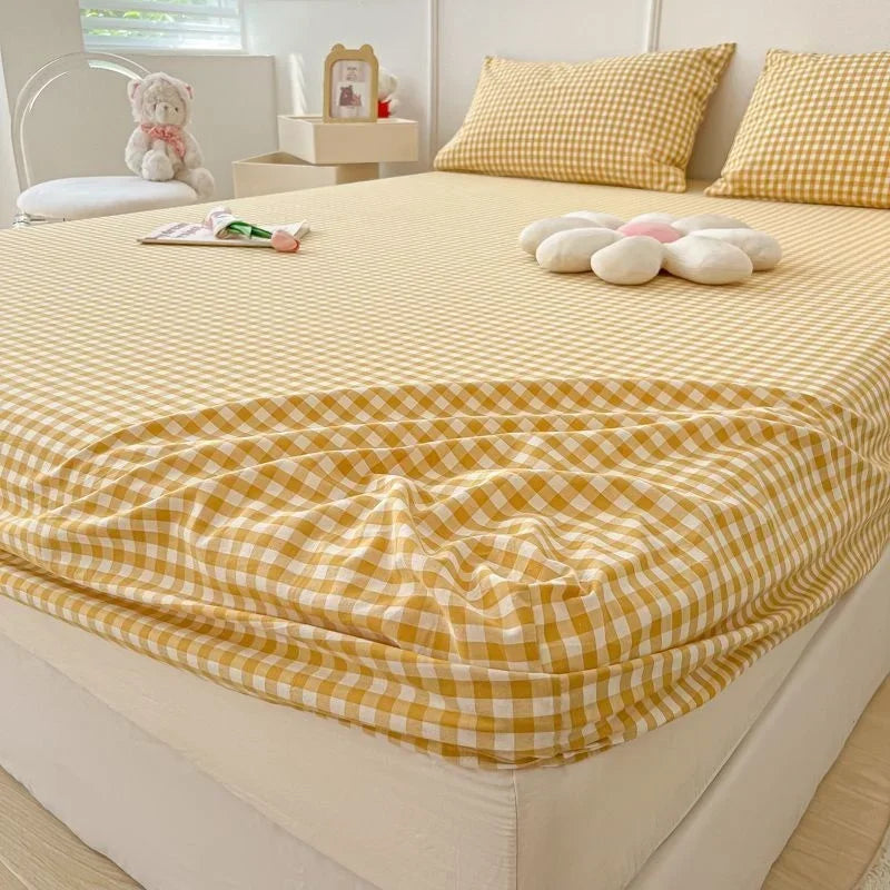 protège matelas carreaux bleu clair gris clair rose clair jaune clair vert clair classique