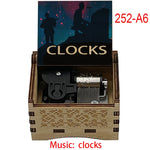 boîte musicale bois naturel motifs floraux 18 tons vintage manivelle horlogerie artisanale