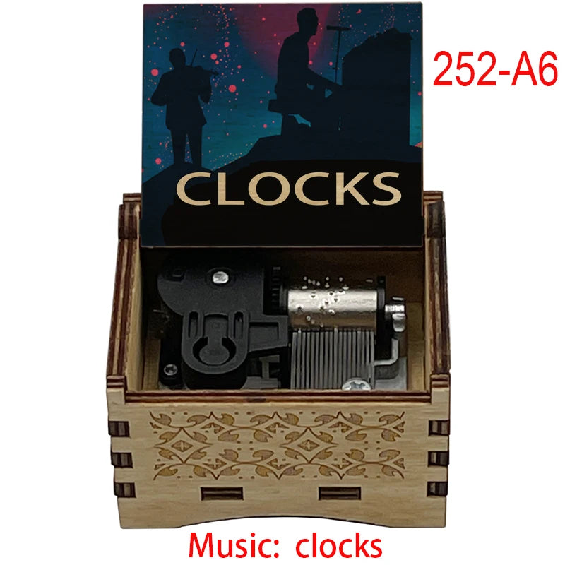 boîte musicale bois naturel motifs floraux 18 tons vintage manivelle horlogerie artisanale