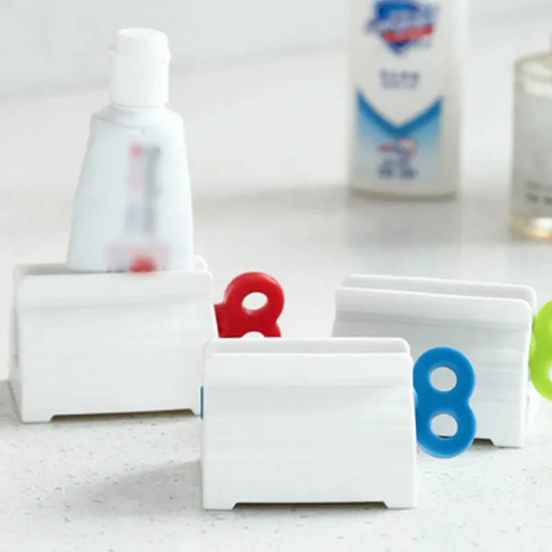 support mural blanc rouge bleu vert tube dentifrice moderne pratique salle bain organisateur anti