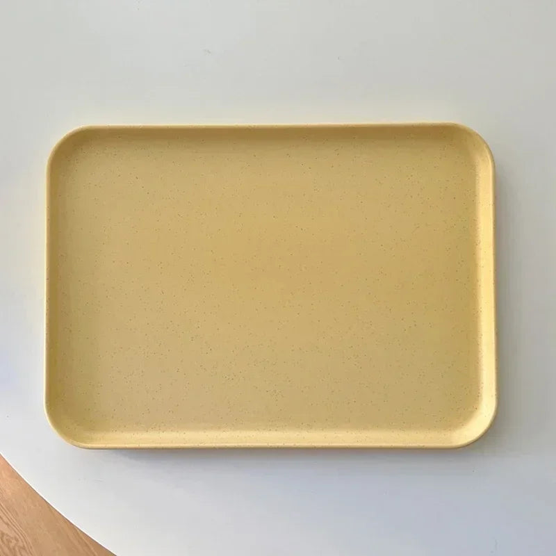 assiettes décoration moderne blanc jaune bleu pastel vert serviette bol cuillère pot confiture tasse