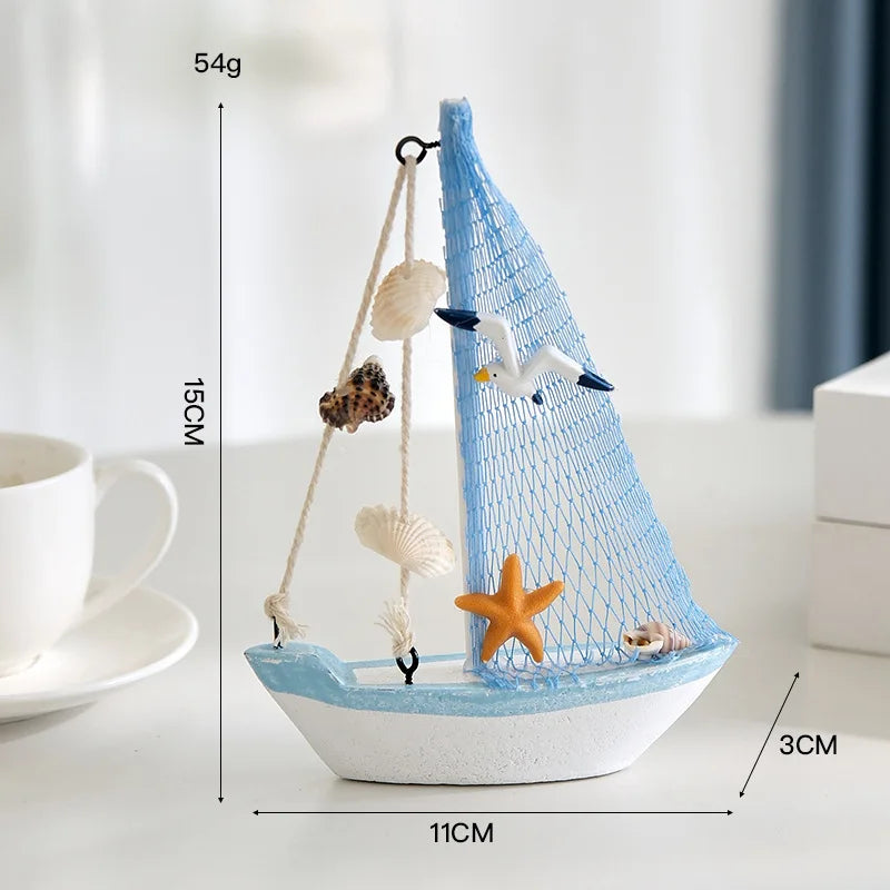 décoration maison bateau voile miniature blanc bleu clair coquillage étoile mer oiseau filet pêche