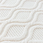 coussin canapé beige clair motif géométrique moderne fixation textile doux maison hiver